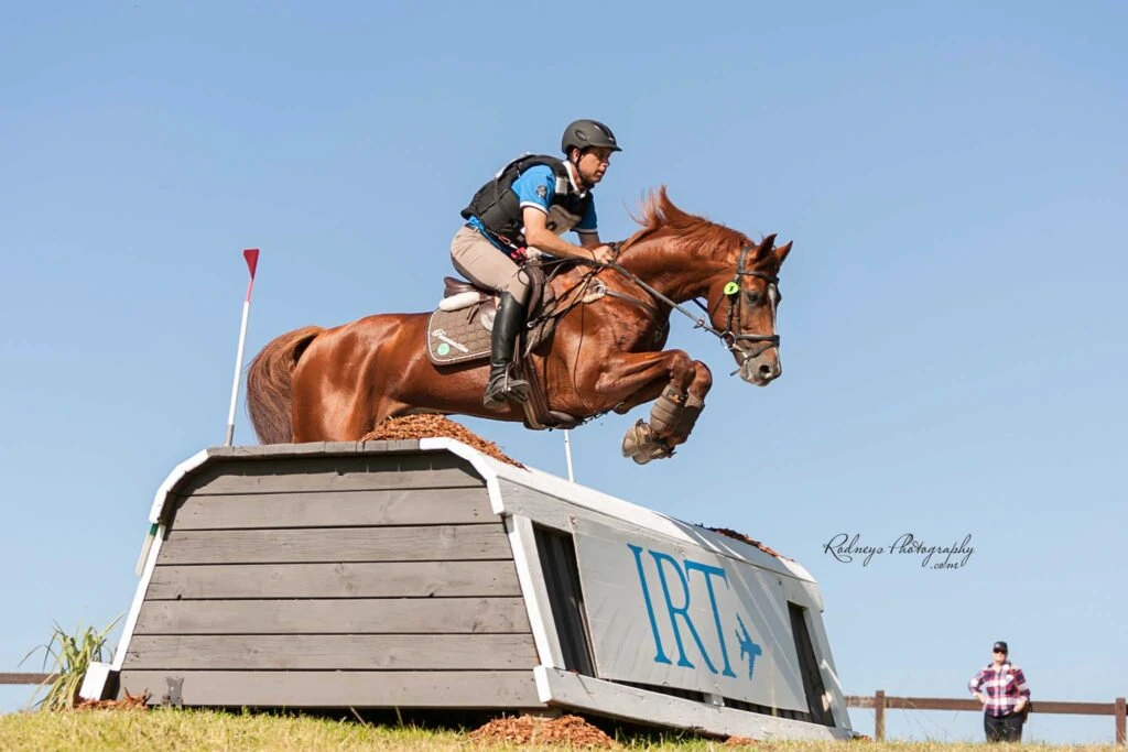 Jumping a cross-country fence