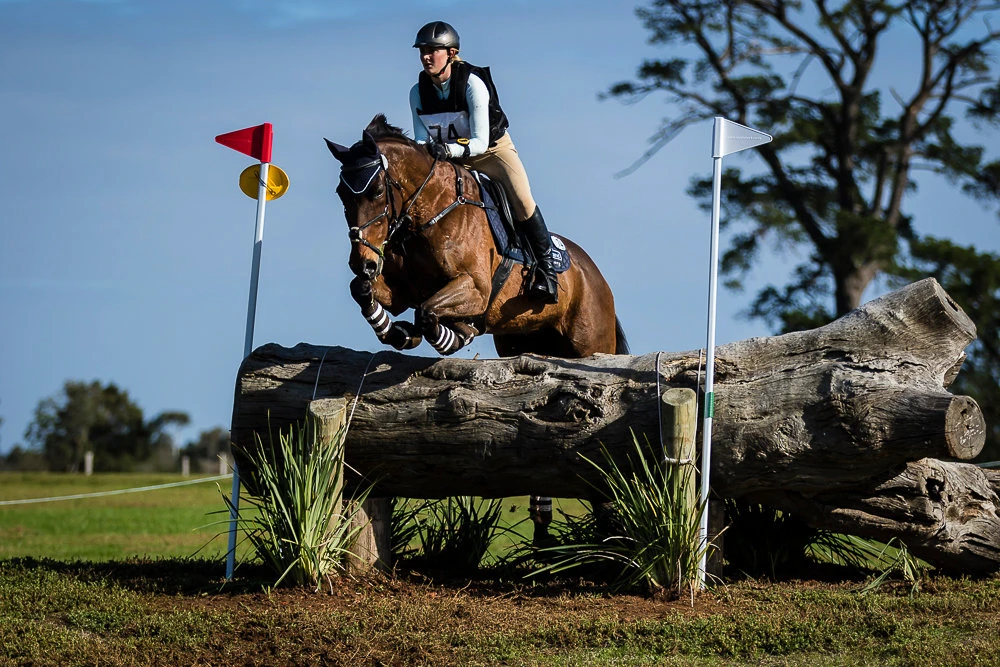 Jumping a cross-country log