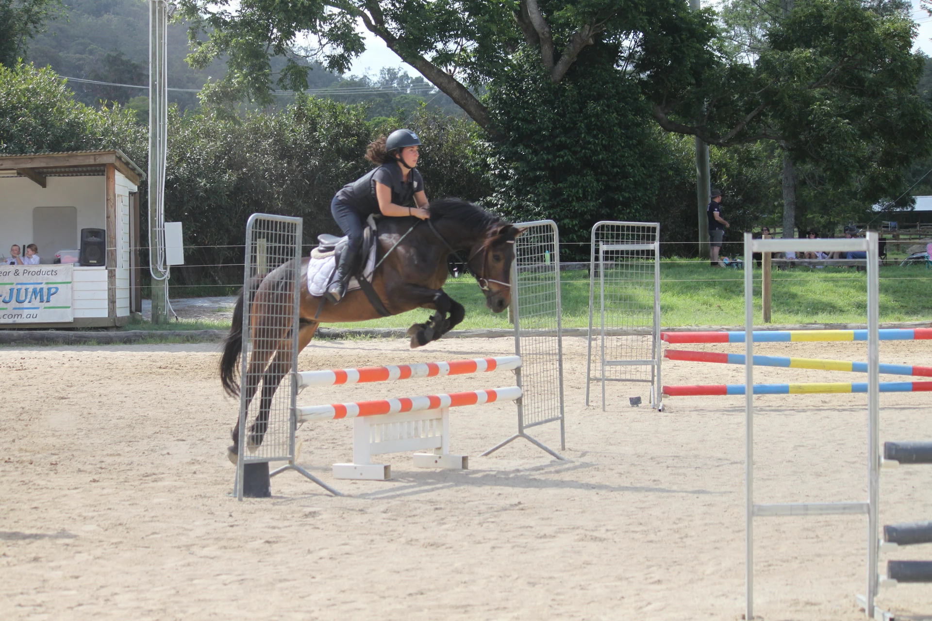 A rider jumping at the onsite competition