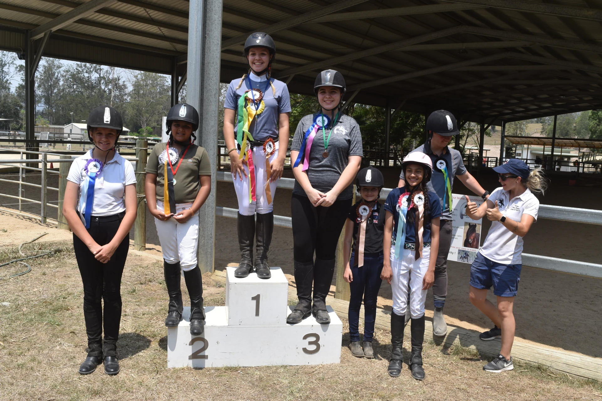 Riders on the podium at an onsite competition