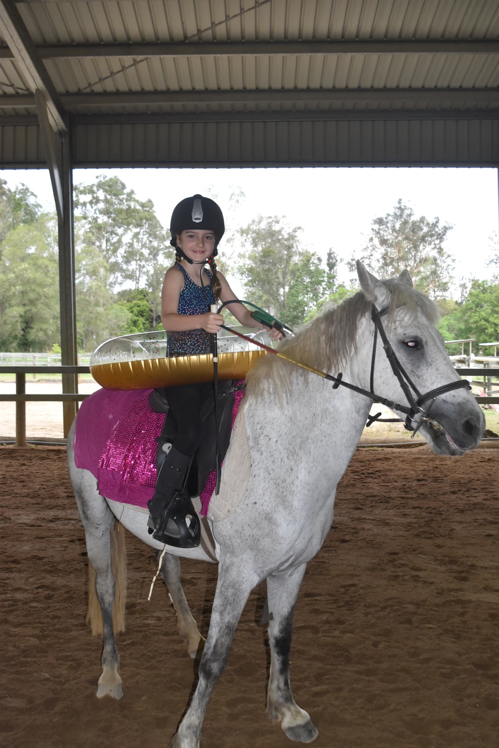 A rider in costume for the end-of-year carrousel