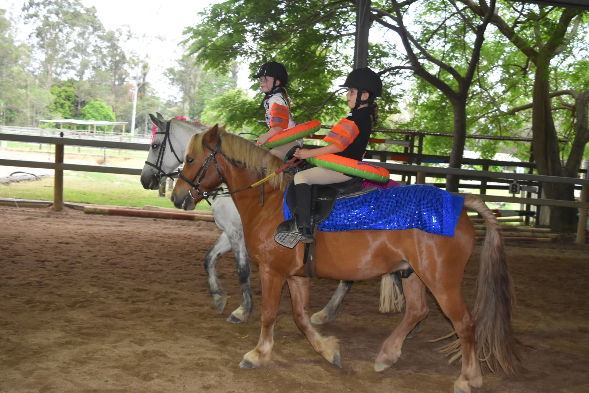 Dressed-up riders at the end-of-year show