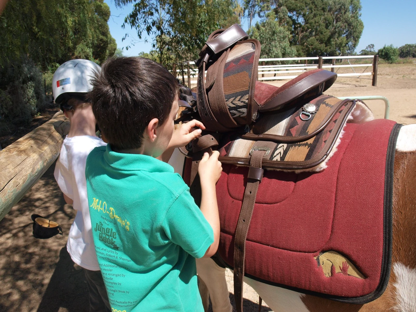 Saddling a horse at HorseHand For A Day