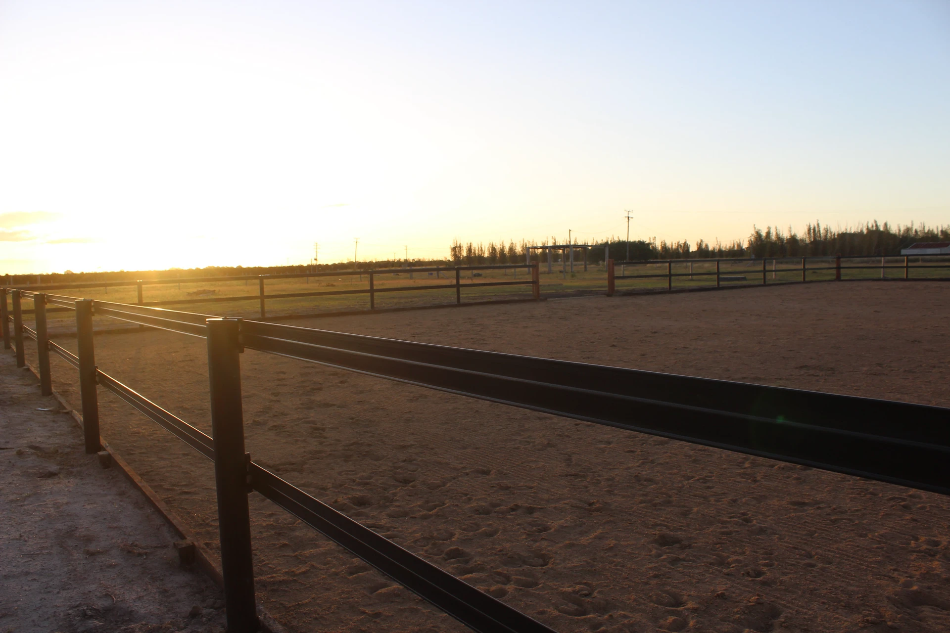 The sand arena at dusk