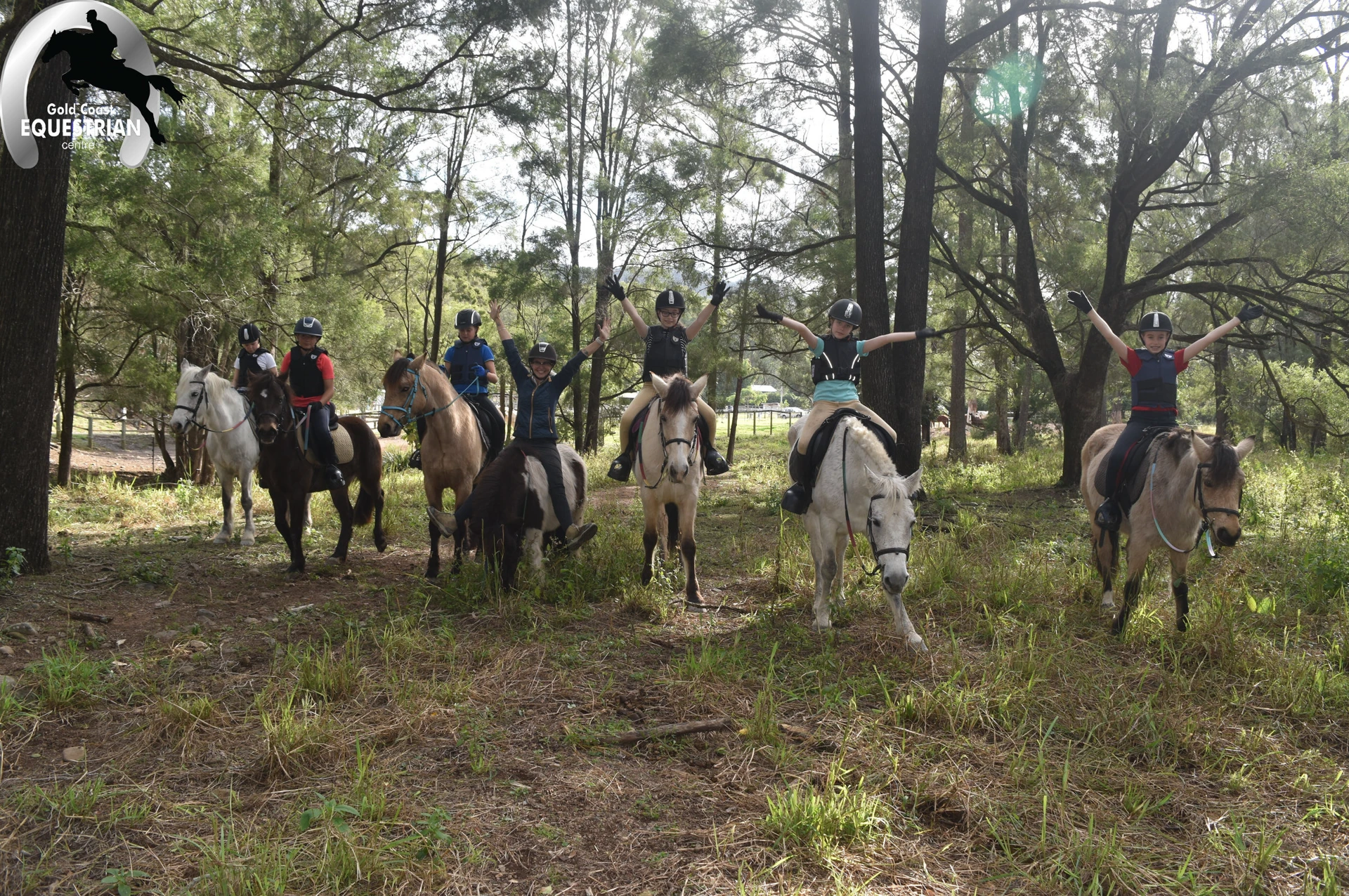 A group heading out on a trail ride