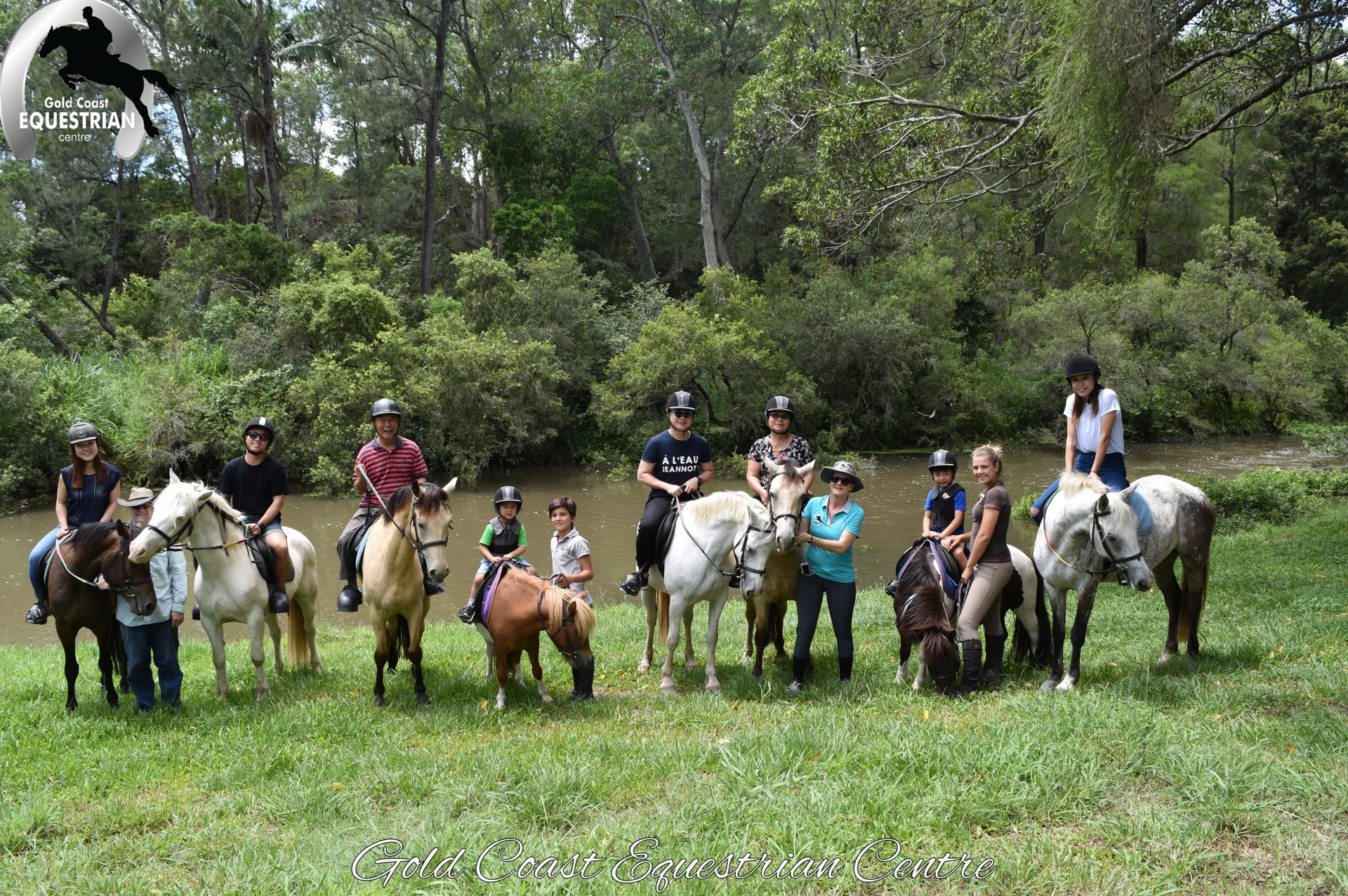 A trail ride group with their ponies