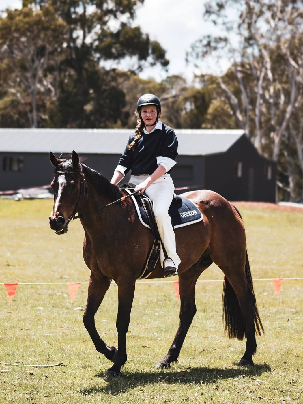 A student riding a school horse at the Oberon Gymkhana