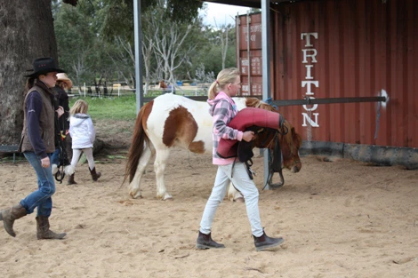 Carrying a saddle