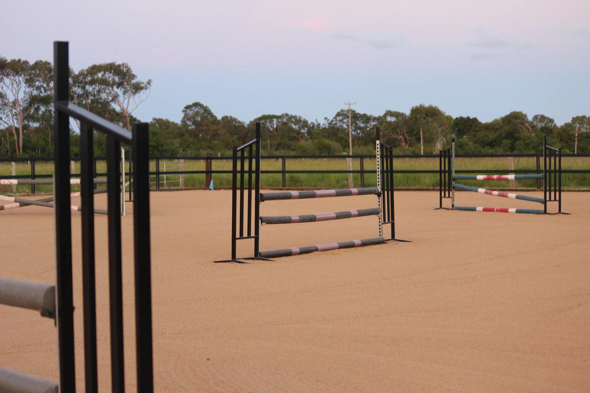 Sand arena with show jumps